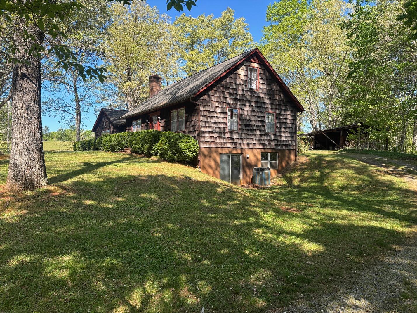 1115 Robin Ridge Road Henry, VA 24102 - Photo 29 of 30 a view of a house with a yard