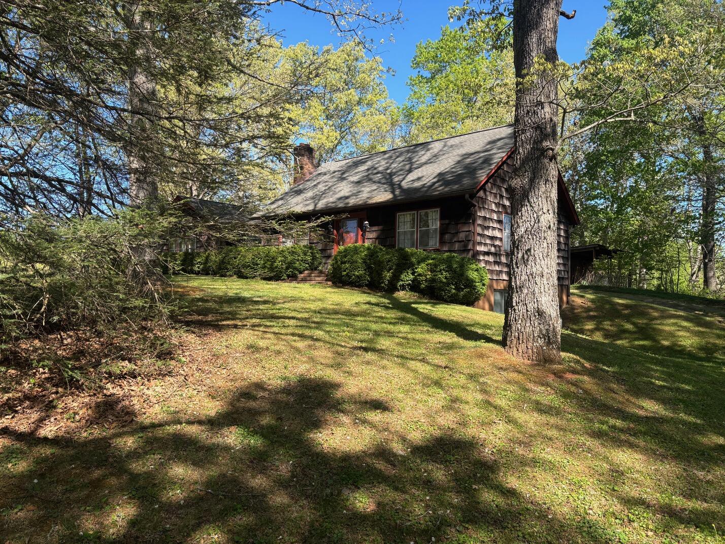 1115 Robin Ridge Road Henry, VA 24102 - Photo 30 of 30 a view of a house with a large tree