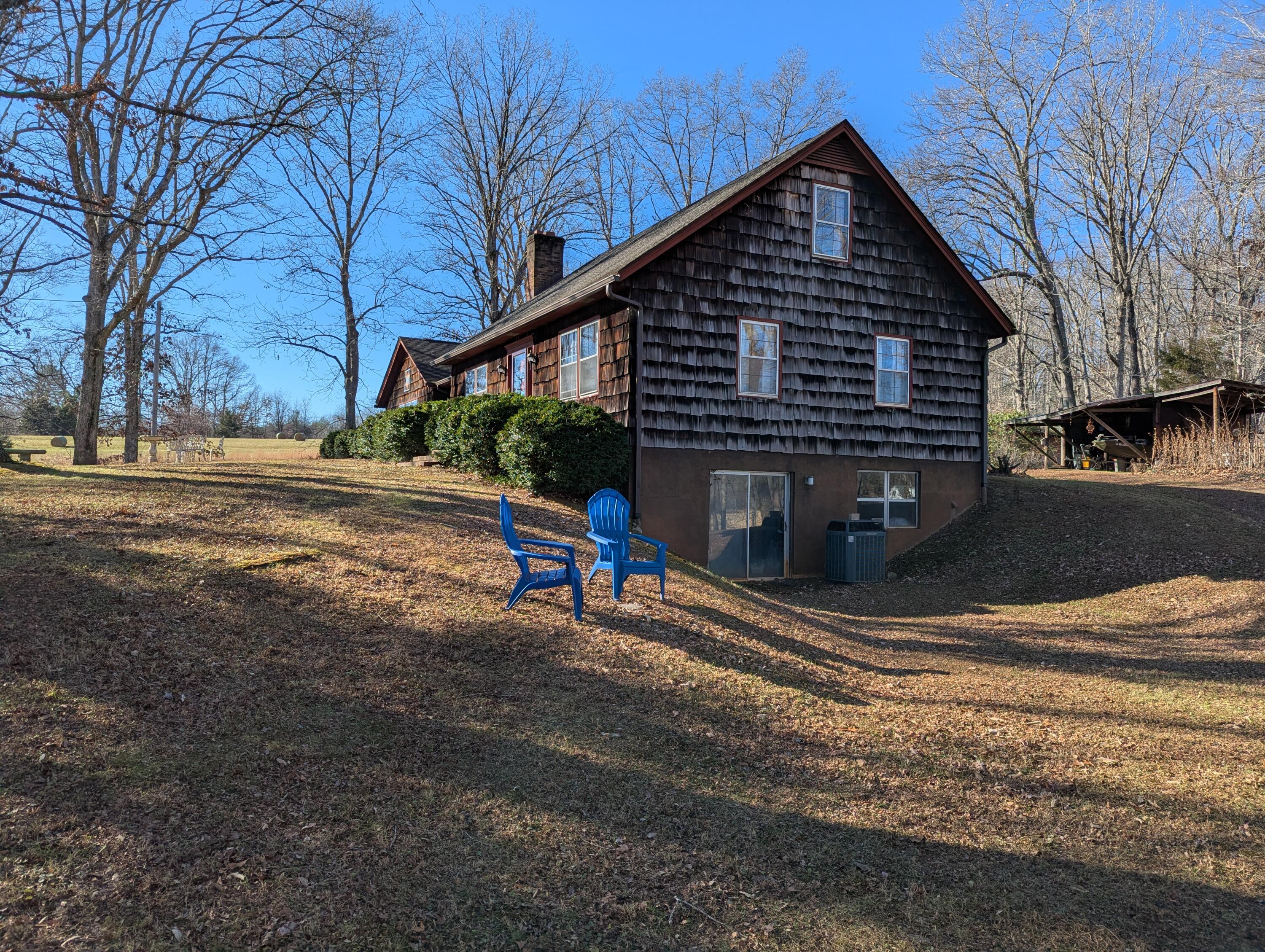 1115 Robin Ridge Road Henry, VA 24102 - Photo 40 of 59 a view of a house with a yard