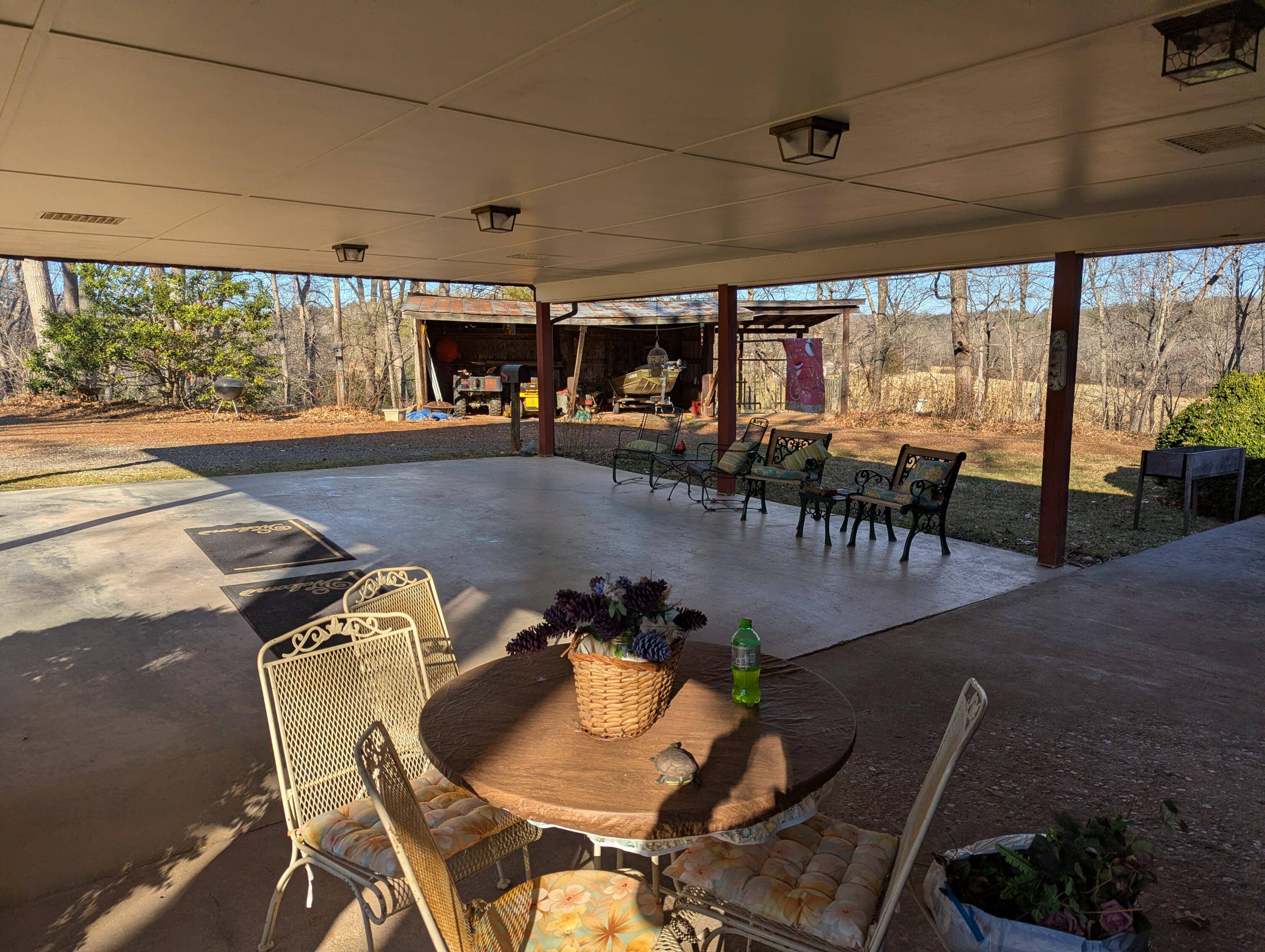 1115 Robin Ridge Road Henry, VA 24102 - Photo 44 of 59 a view of a dining room with furniture window and outside view