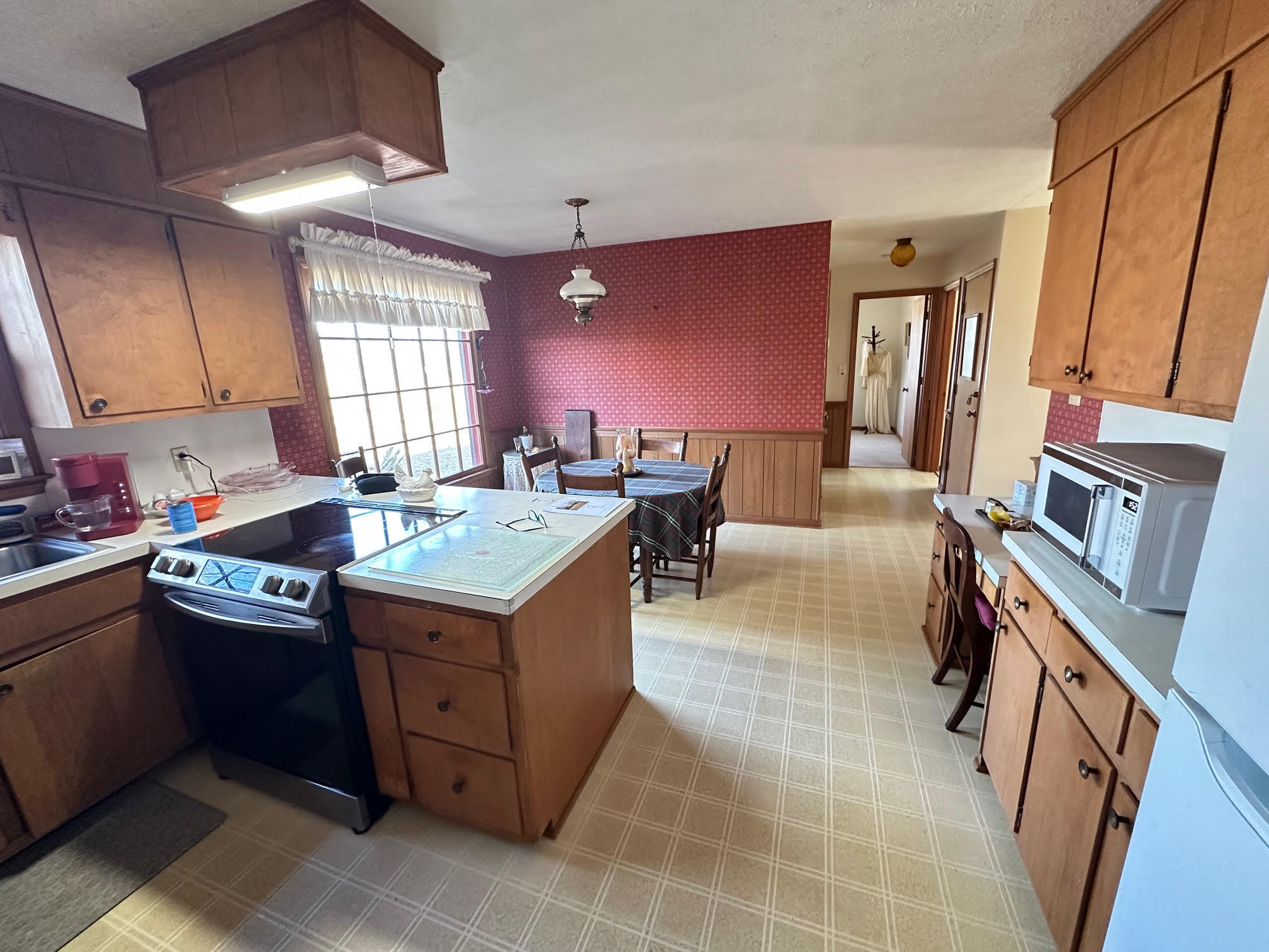 1115 Robin Ridge Road Henry, VA 24102 - Photo 47 of 59 a kitchen with a stove window and cabinets