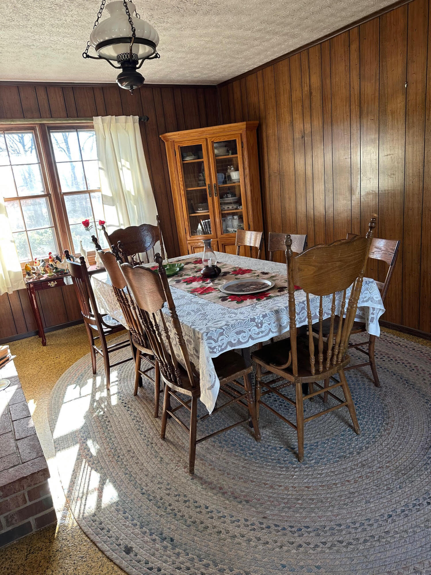 1115 Robin Ridge Road Henry, VA 24102 - Photo 51 of 59 a dining room with a wooden table and chairs