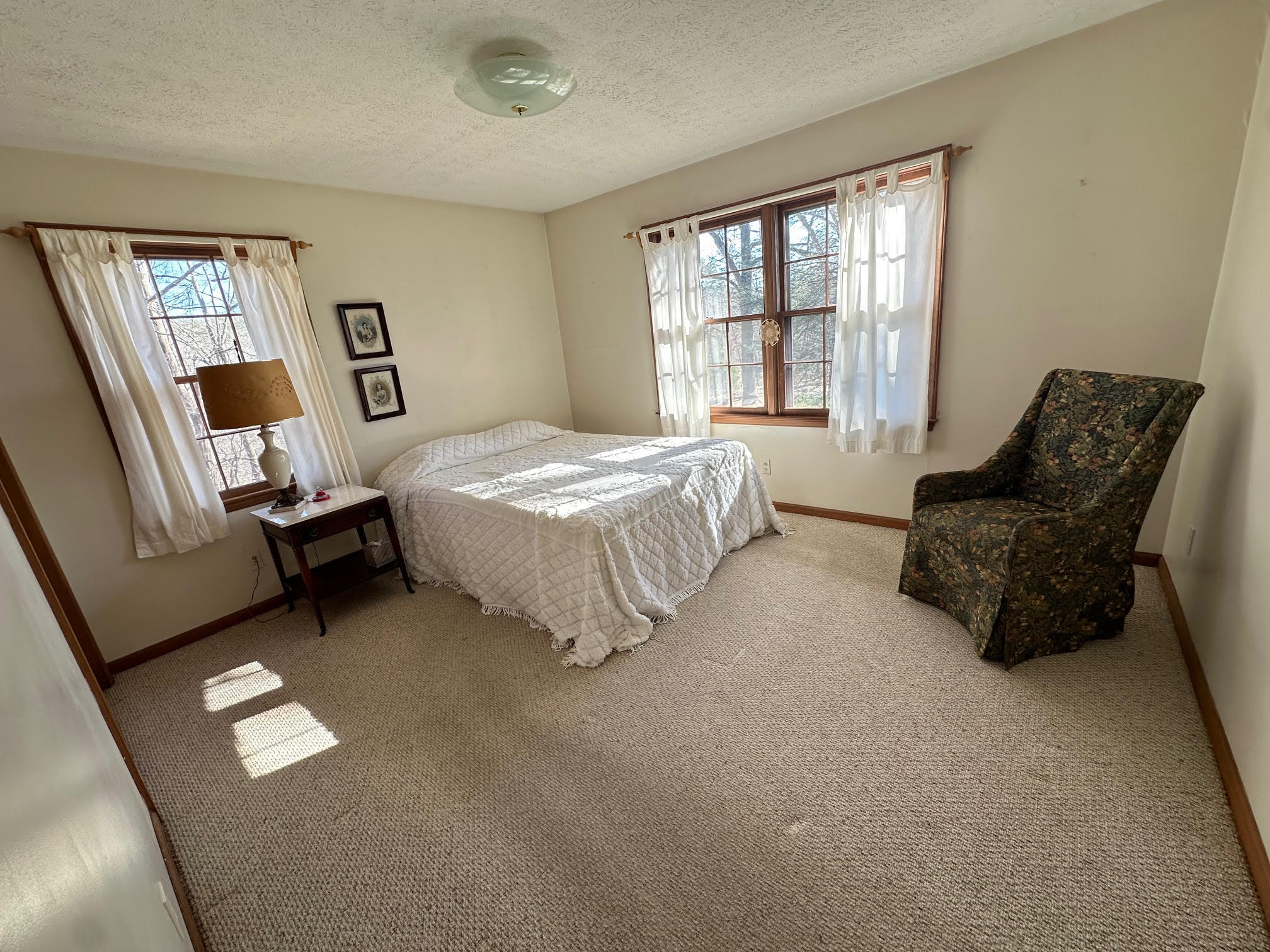 1115 Robin Ridge Road Henry, VA 24102 - Photo 54 of 59 a spacious bedroom with a bed and a couch