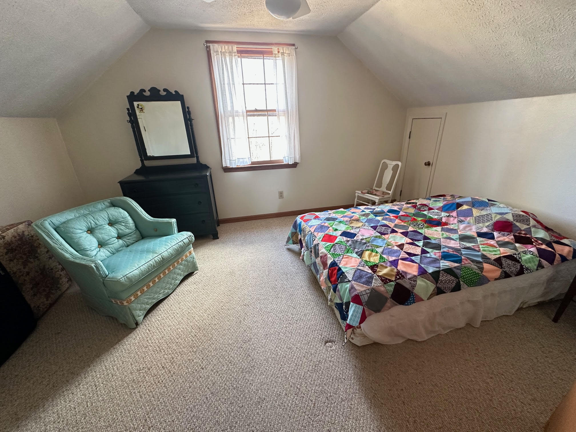 1115 Robin Ridge Road Henry, VA 24102 - Photo 57 of 59 a bedroom with a bed chair and window