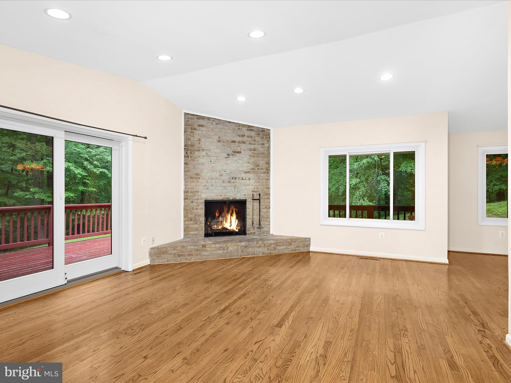 8114 Anita Road Baltimore, MD 21208 - Photo 6 of 49 Living Room with Vaulted Ceiling