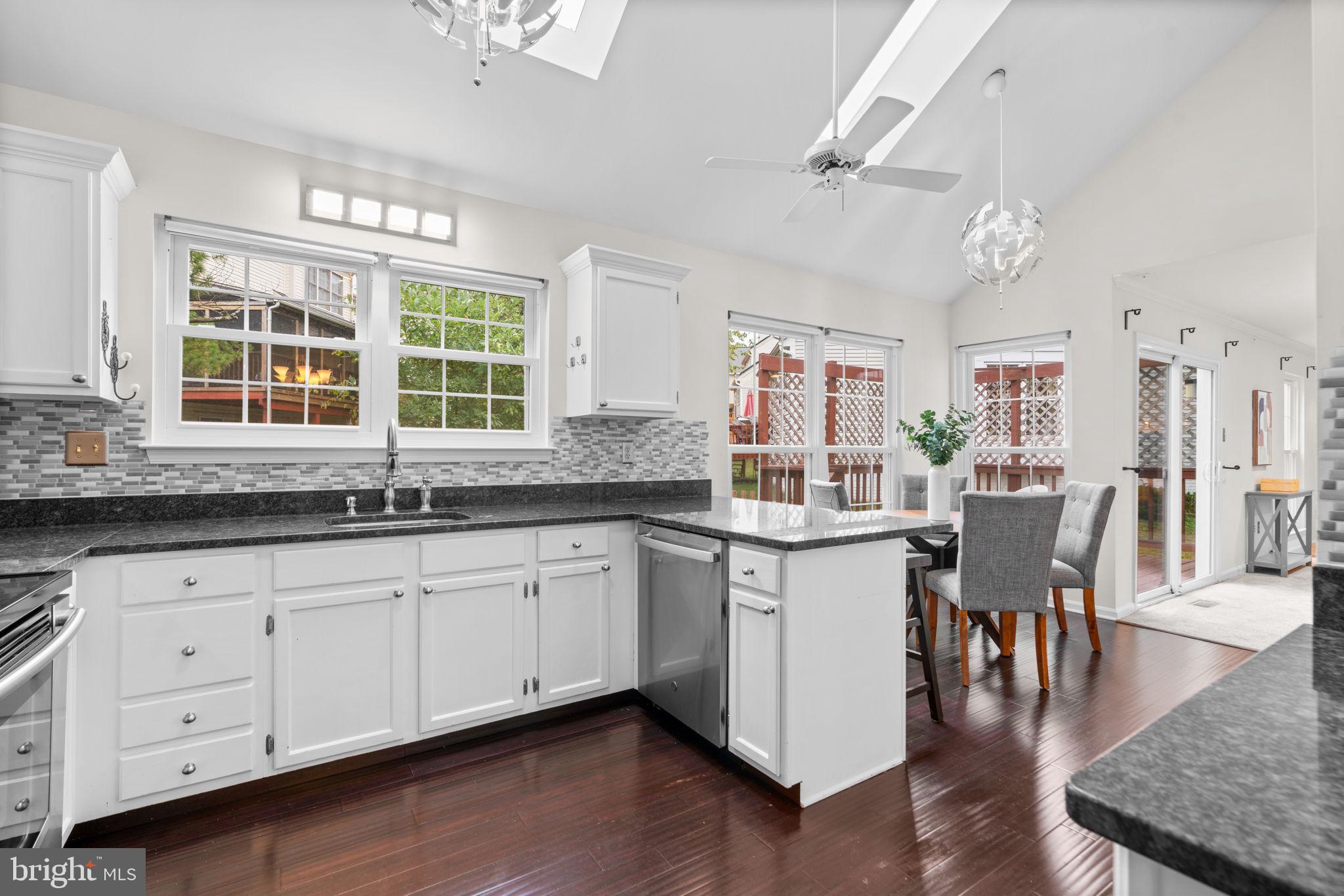 2611 Hawkshead Court Silver Spring, MD 20904 - Photo 10 of 49 Big eat-in kitchen with bar seating and skylights