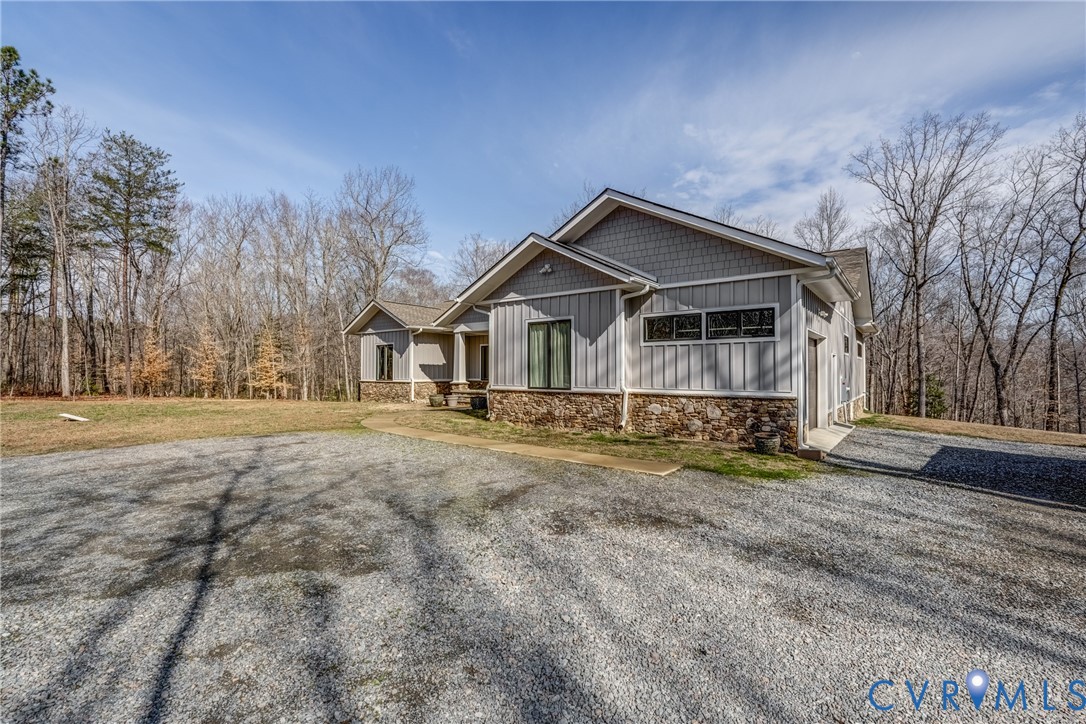 33051 Walnut Grove Farm Lane Hanover, VA 23069 - Photo 2 of 76 a view of a house with a yard covered in snow