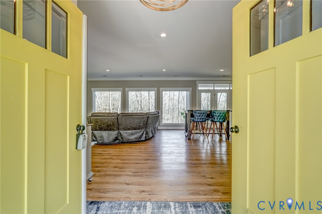 33051 Walnut Grove Farm Lane Hanover, VA 23069 - Photo 36 of 76 a living room with furniture and a wooden floor