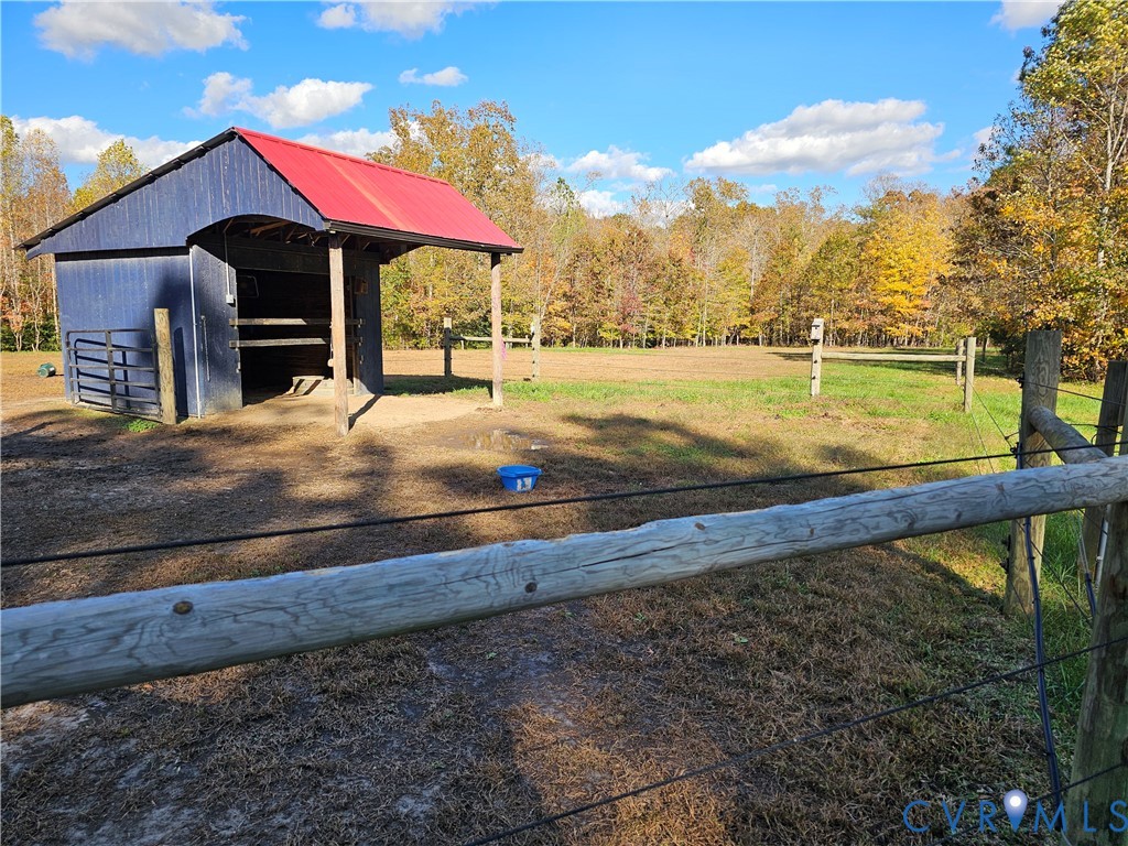 33051 Walnut Grove Farm Lane Hanover, VA 23069 - Photo 5 of 50 a view of a house with a yard