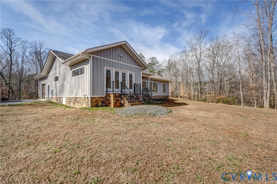 33051 Walnut Grove Farm Lane Hanover, VA 23069 - Photo 6 of 76 a front view of a house with a yard