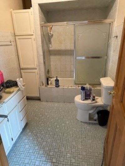 12257 Waterman Road Waterman, IL 60556 - Photo 21 of 22 a bathroom with a sink toilet and shower