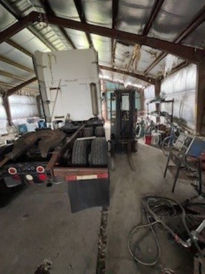 12257 Waterman Road Waterman, IL 60556 - Photo 9 of 22 a view of a room with gym equipment