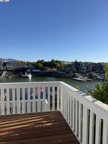 an aerial view of a house with a ocean view