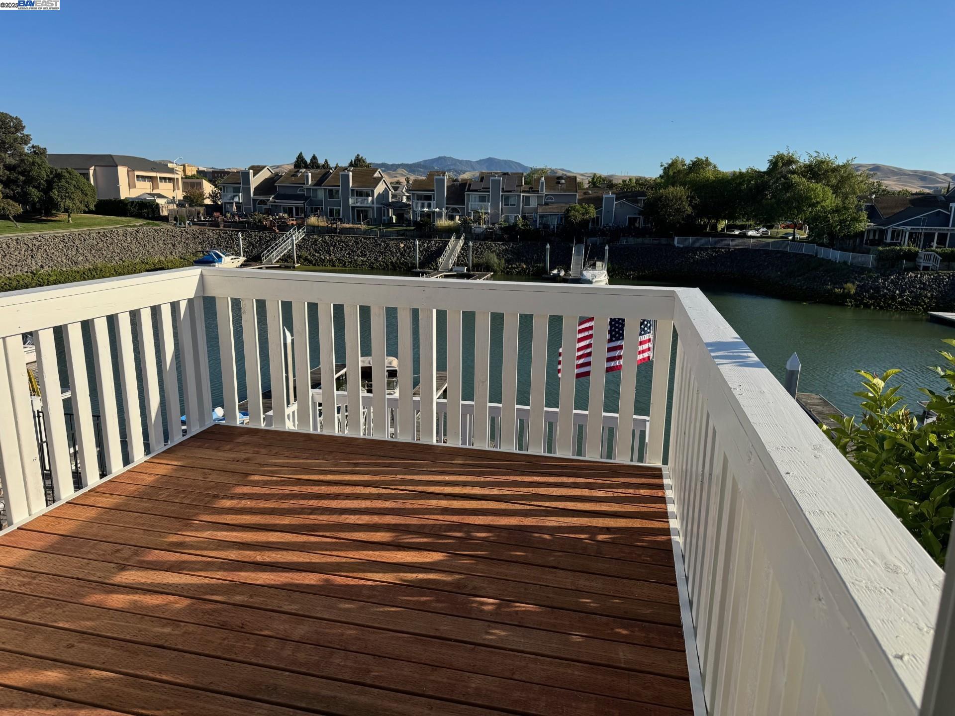 118 Pelican Loop Pittsburg, CA 94565 - Photo 17 of 21 a view of balcony with wooden floor and lake view
