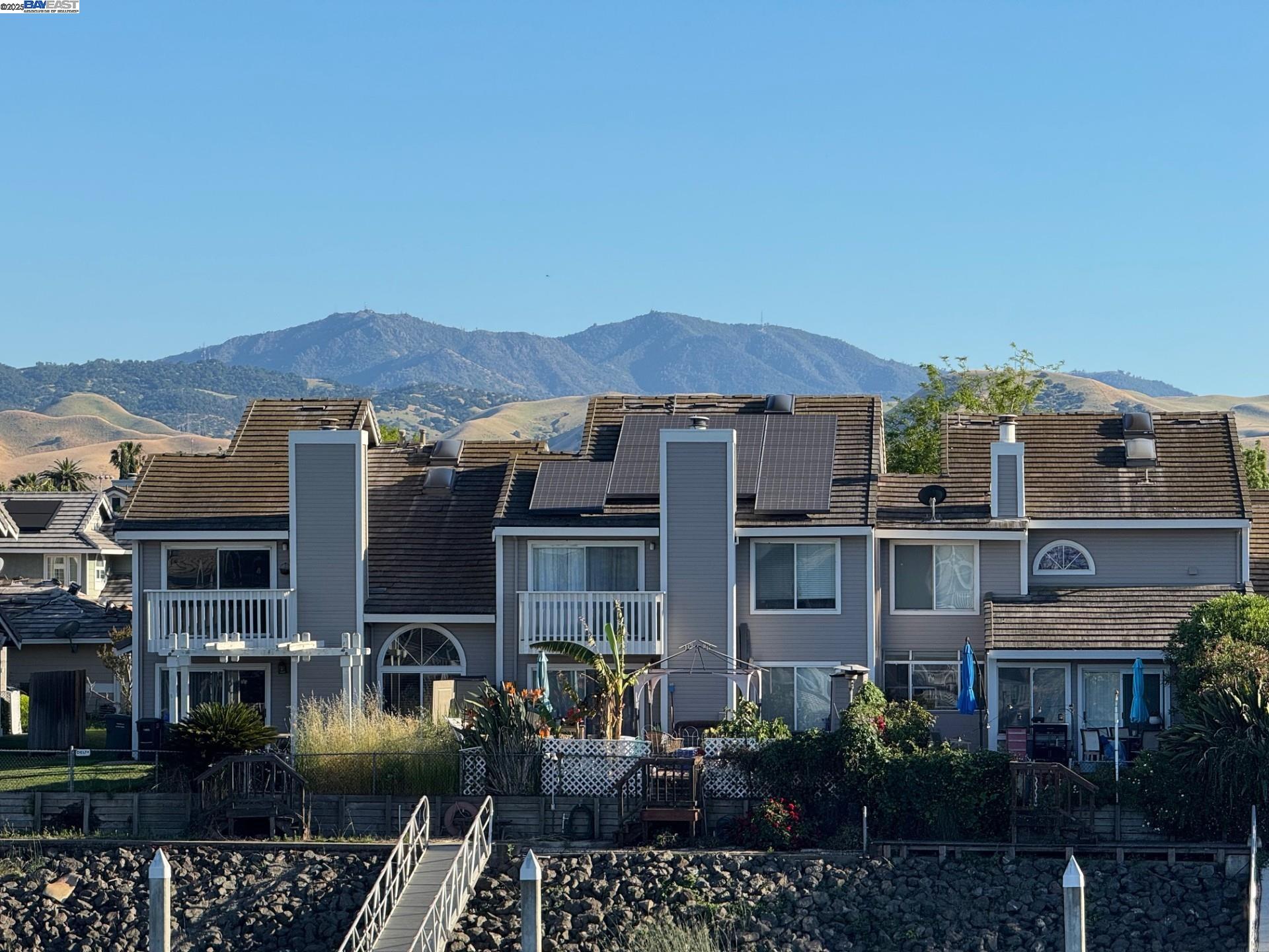 118 Pelican Loop Pittsburg, CA 94565 - Photo 18 of 21 a view of multiple houses with a mountain