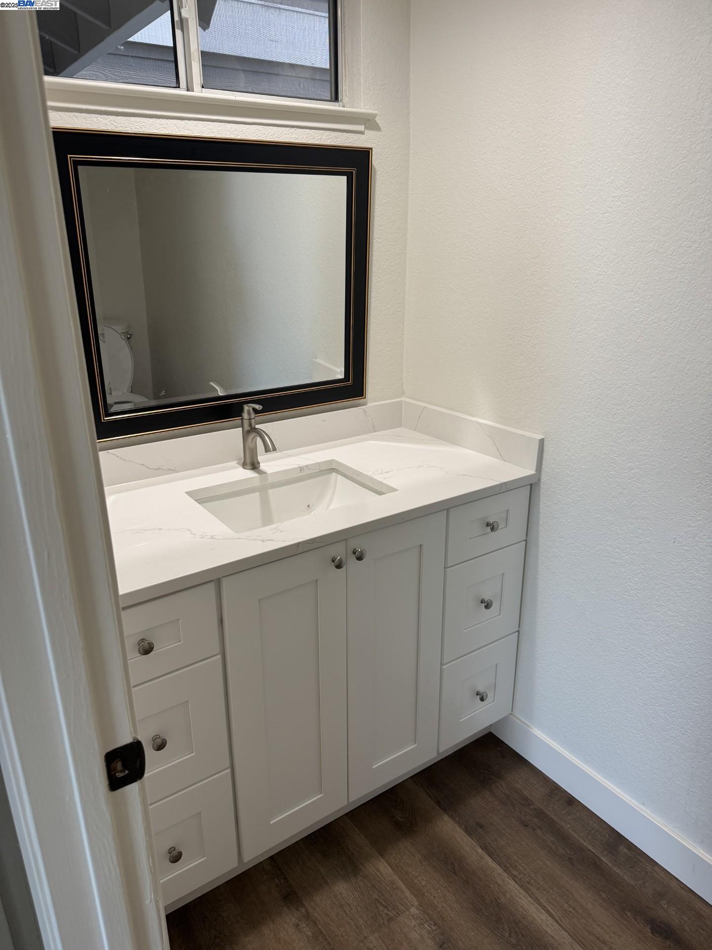 118 Pelican Loop Pittsburg, CA 94565 - Photo 19 of 21 a bathroom with a sink and mirror
