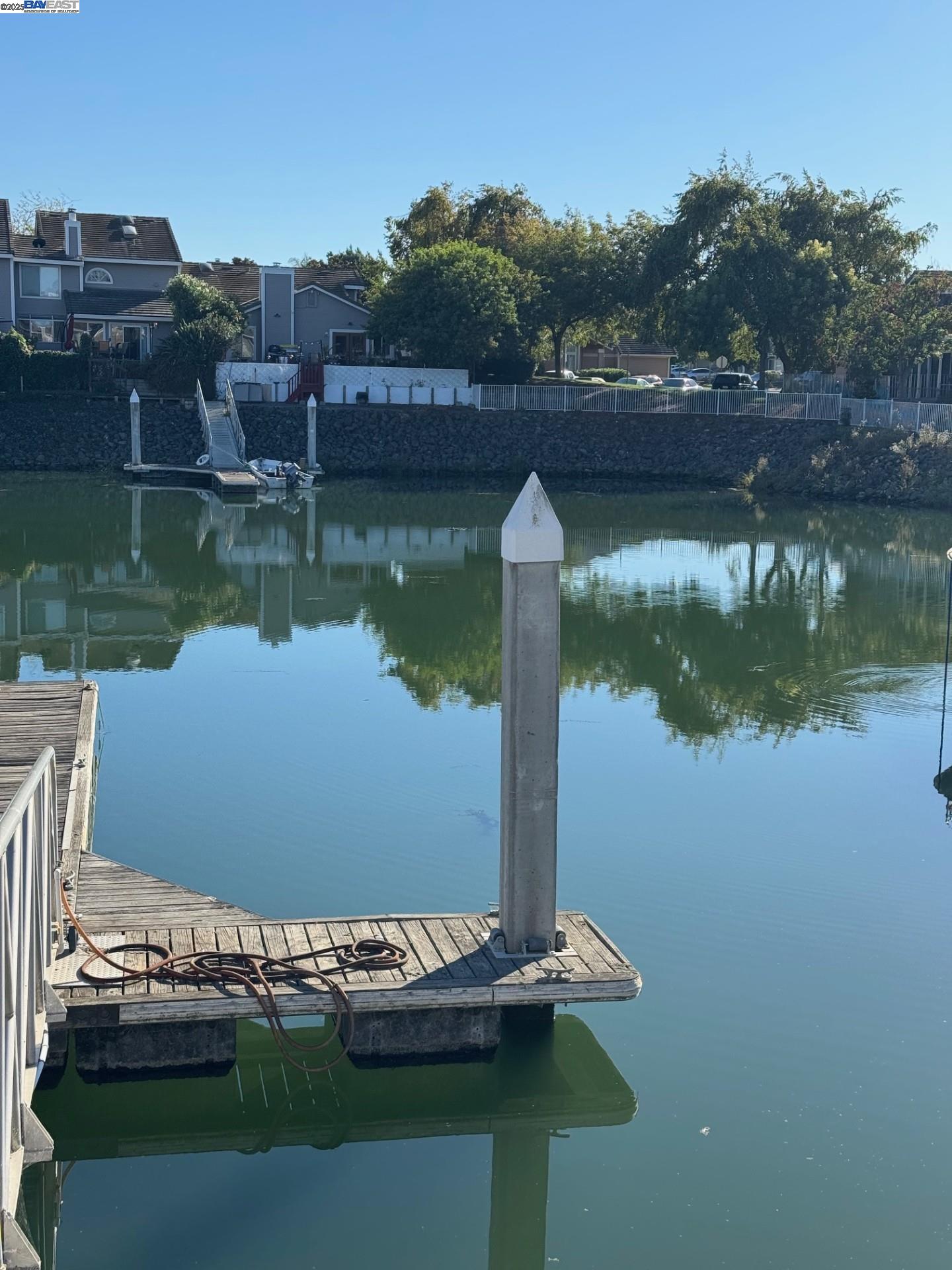118 Pelican Loop Pittsburg, CA 94565 - Photo 20 of 21 a view of a lake with houses in the back