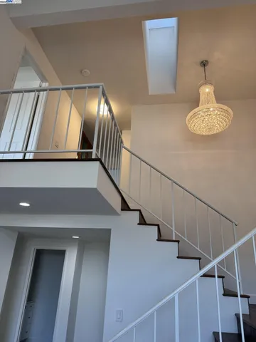 a view of entryway and kitchen