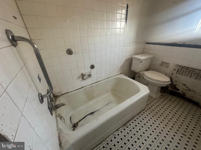 554 Wiltshire Road Upper Darby, PA 19082 - Photo 17 of 18 a bathroom with a sink a toilet and shower