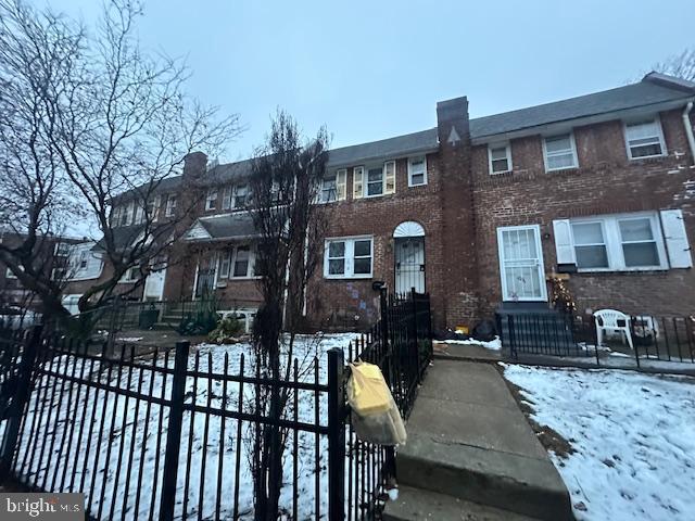 554 Wiltshire Road Upper Darby, PA 19082 - Photo 3 of 18 a front view of a residential apartment building with a yard