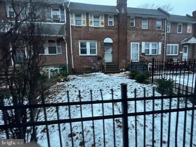 554 Wiltshire Road Upper Darby, PA 19082 - Photo 4 of 18 a view of a brick house with large windows
