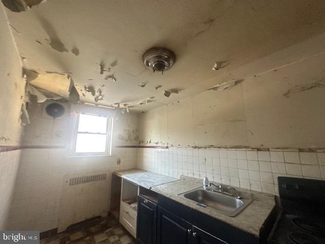 554 Wiltshire Road Upper Darby, PA 19082 - Photo 9 of 18 a bathroom with a sink and mirror