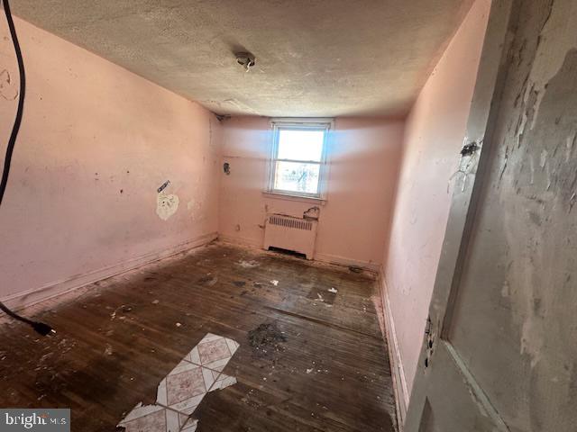 554 Wiltshire Road Upper Darby, PA 19082 - Photo 10 of 18 a view of a livingroom with an empty space and a window