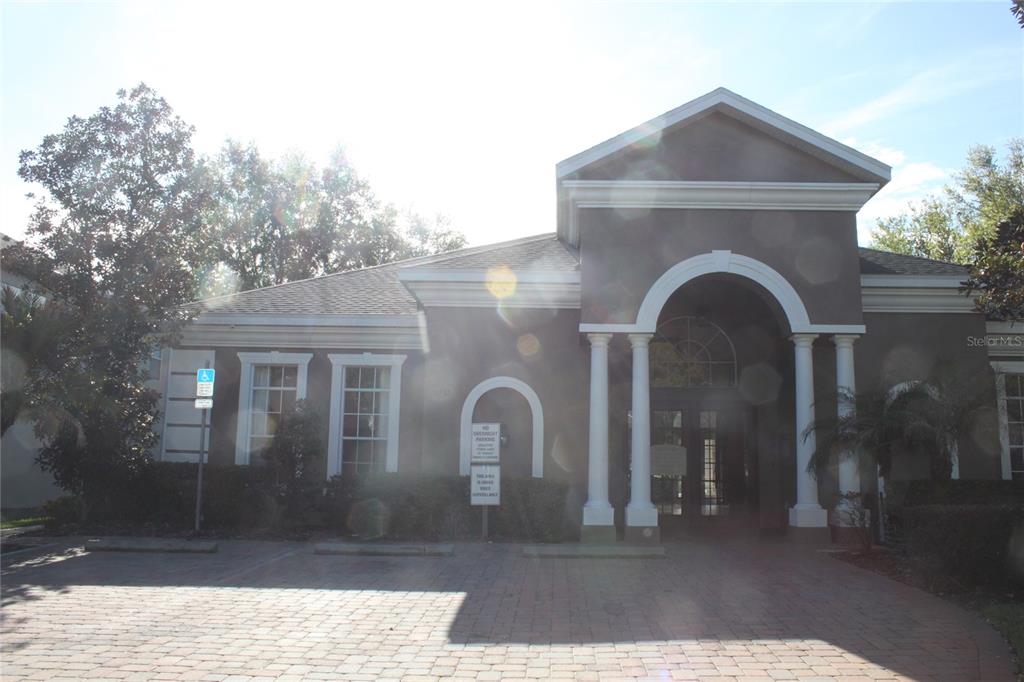 3222 Villa Strada Way Orlando, FL 32835 - Photo 21 of 26 a front view of a house with garden