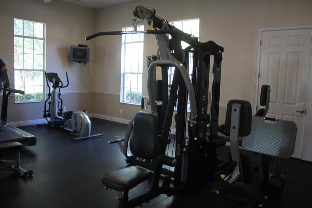 3222 Villa Strada Way Orlando, FL 32835 - Photo 24 of 26 a view of a room with gym equipment