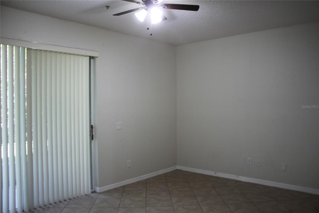 3222 Villa Strada Way Orlando, FL 32835 - Photo 7 of 26 wooden floor in an empty room