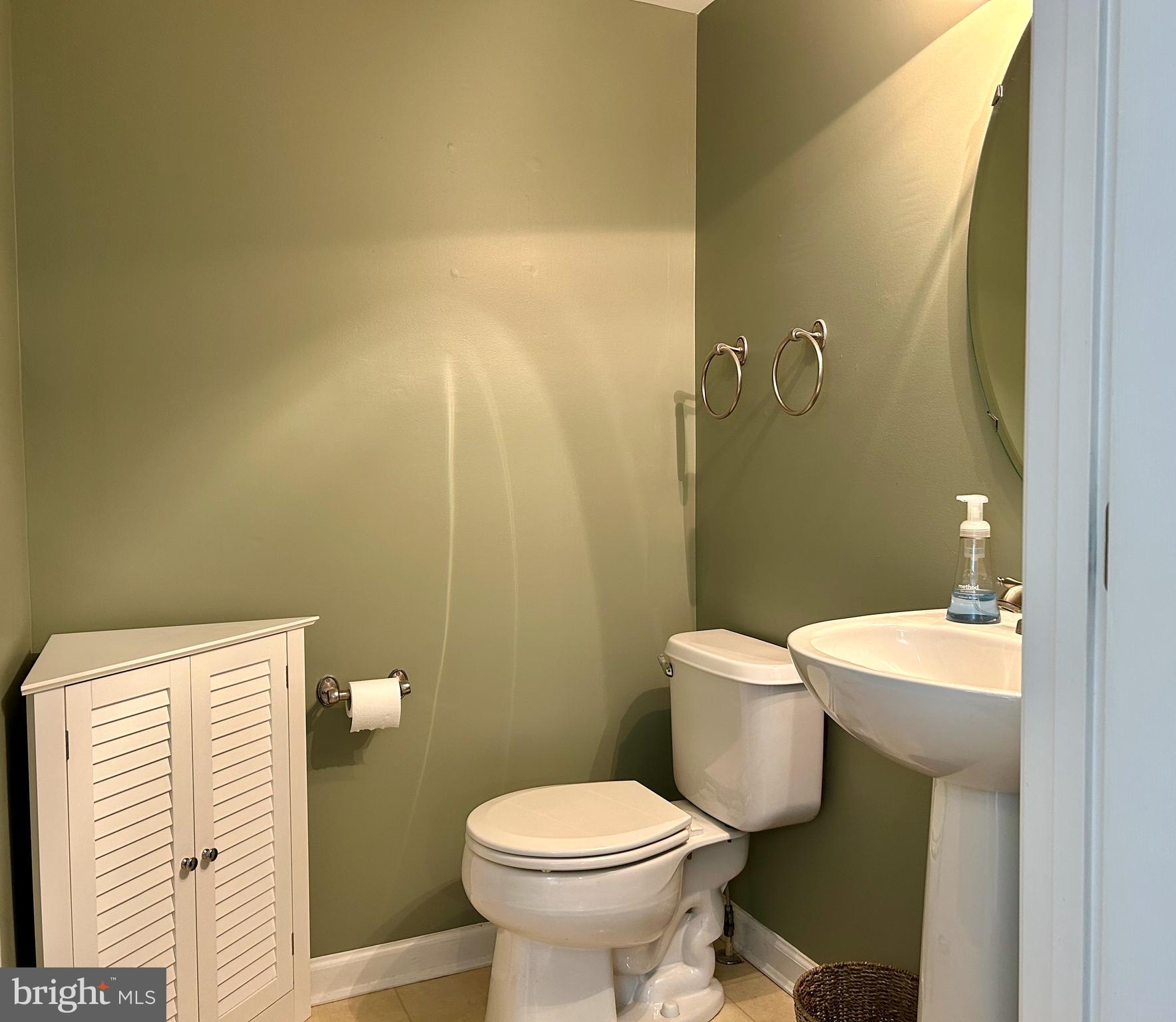 55 Alexis Drive Newark, DE 19702 - Photo 11 of 27 a bathroom with a sink and a toilet