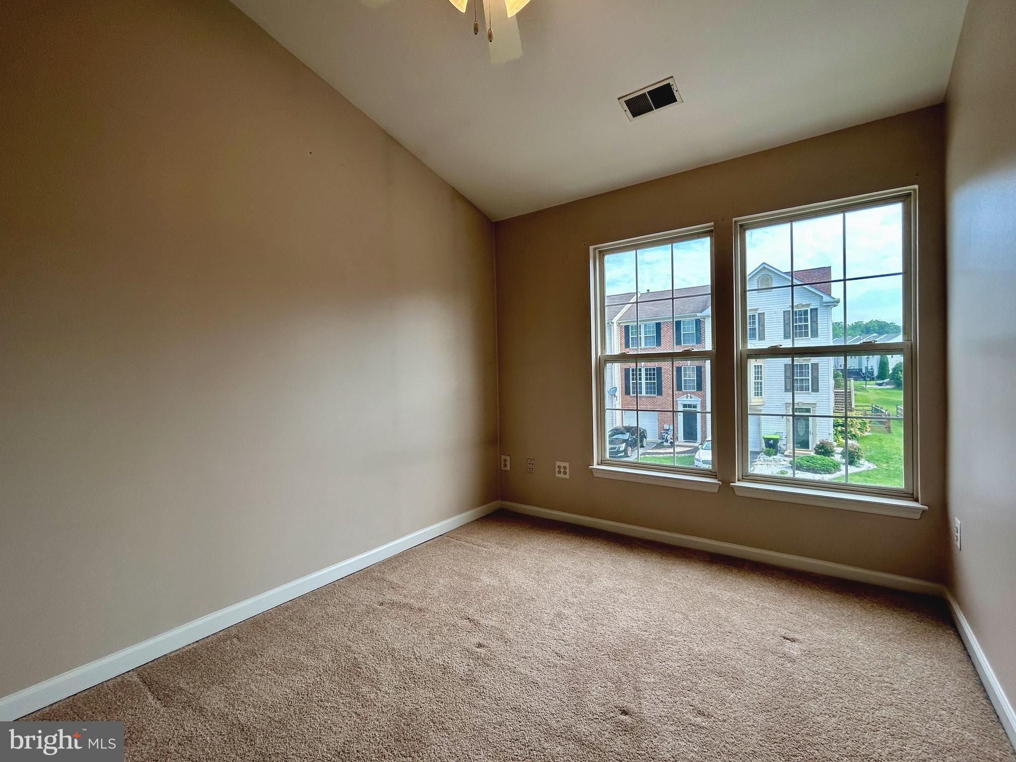 55 Alexis Drive Newark, DE 19702 - Photo 14 of 27 an empty room with a window