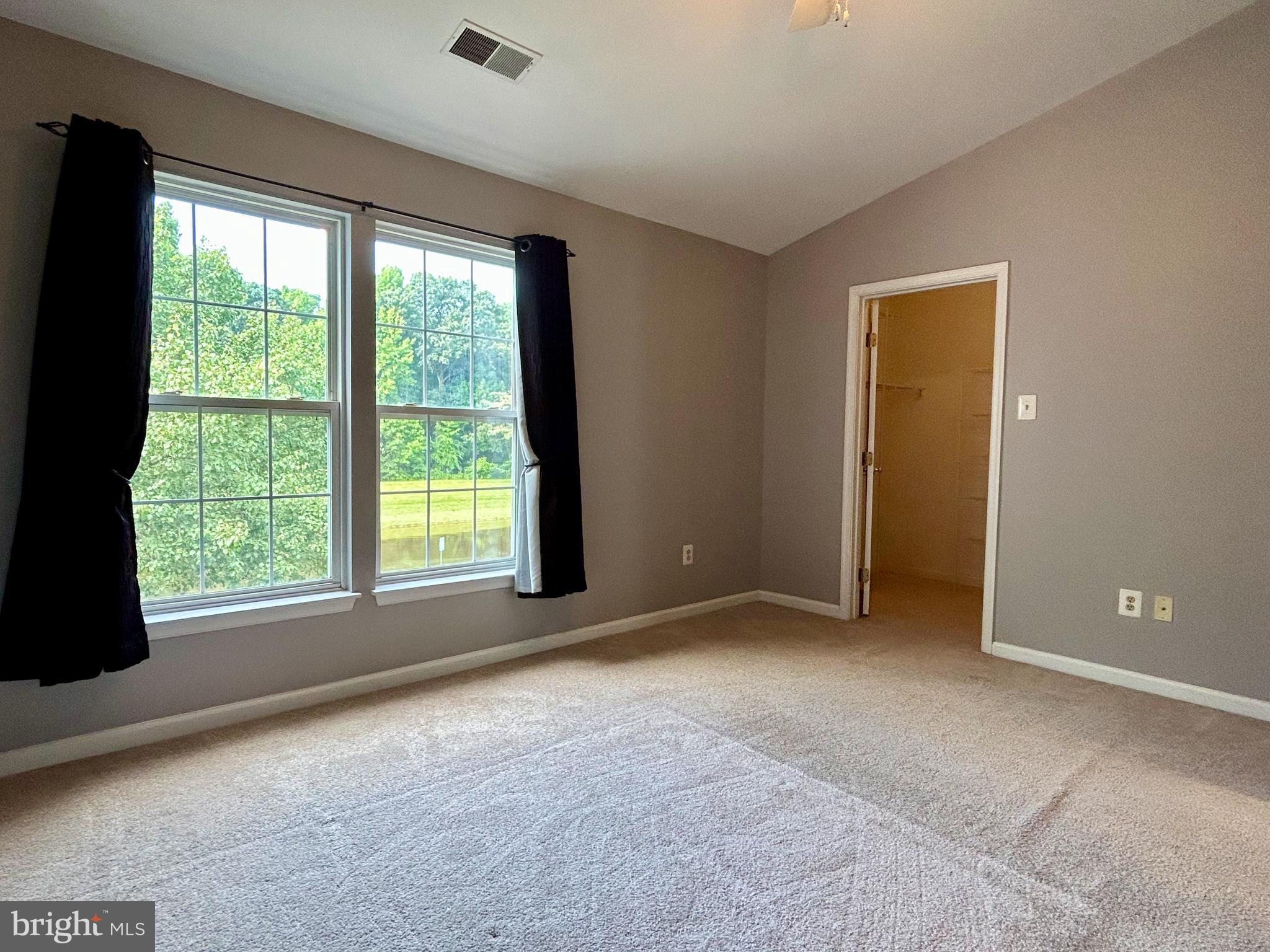 55 Alexis Drive Newark, DE 19702 - Photo 16 of 27 a view of an empty room with a window