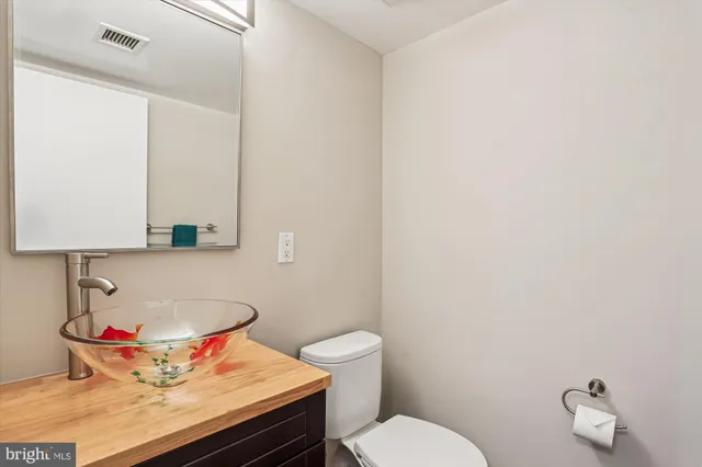 a bathroom with a sink and a toilet