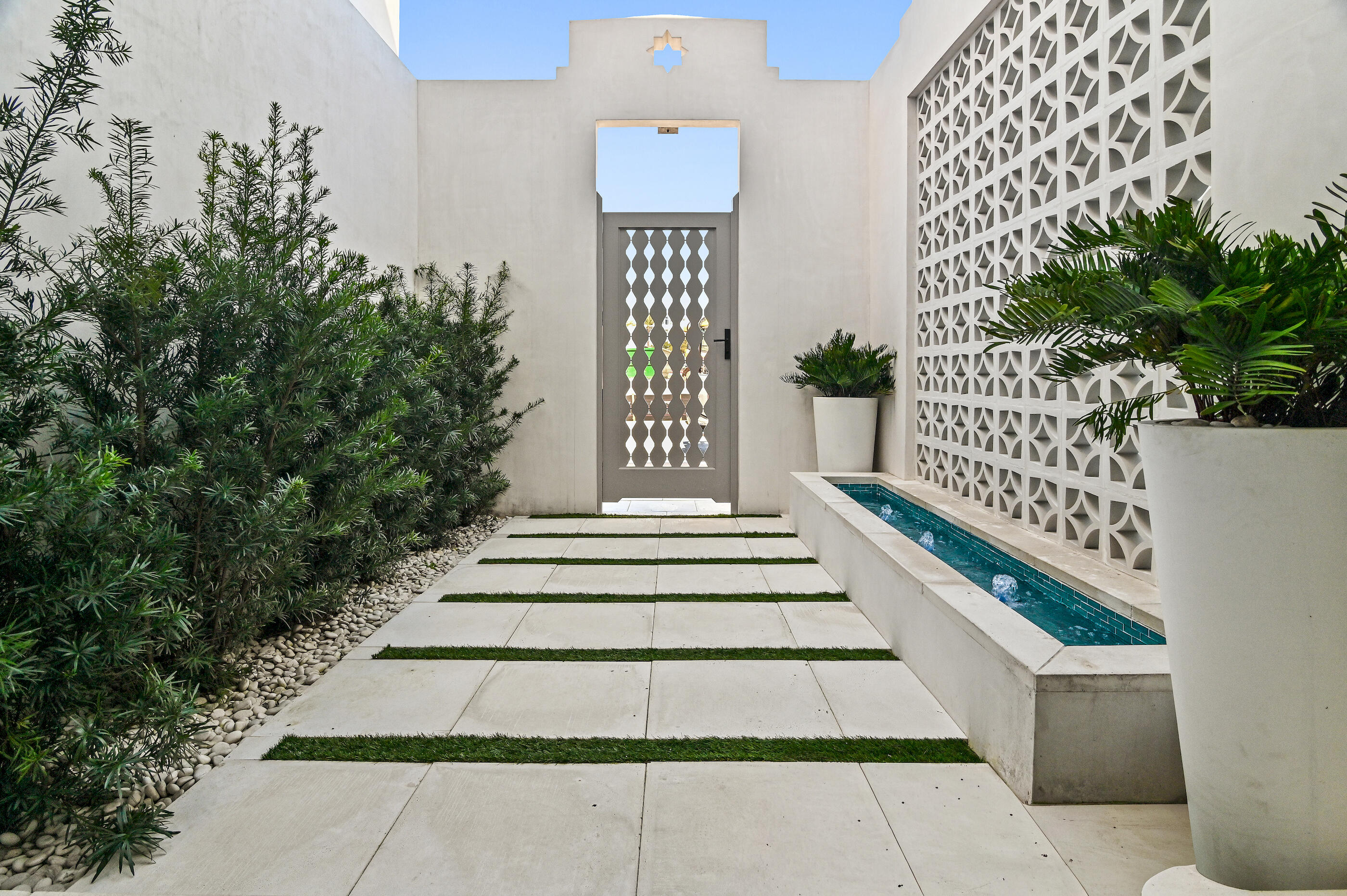 155 Elbow Beach Rd Inlet Beach Inlet Beach, FL 32461 - Photo 10 of 49 11 - Entry Courtyard + Water Feature
