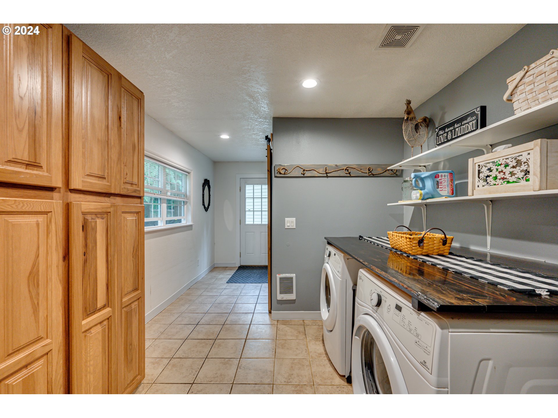 631 Clark Creek Road Longview, WA 98632 - Photo 18 of 40 a utility room with closet dryer and washer
