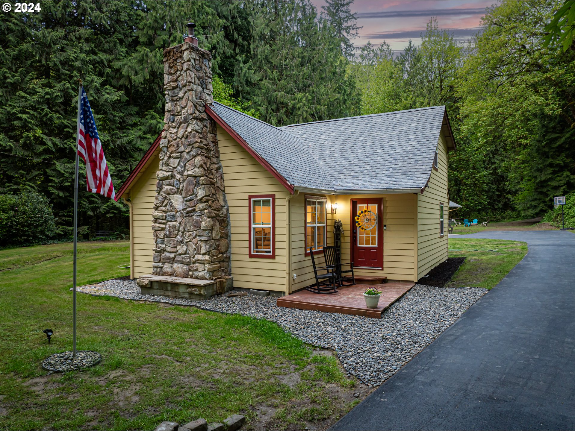 631 Clark Creek Road Longview, WA 98632 - Photo 2 of 40 a view of a house with backyard porch and garden