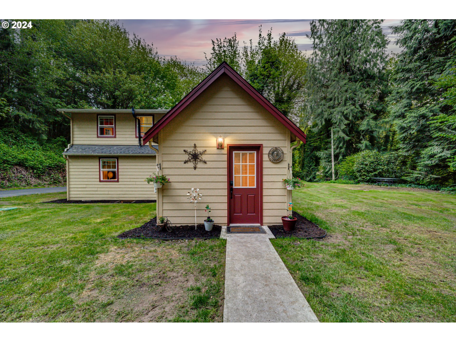631 Clark Creek Road Longview, WA 98632 - Photo 29 of 40 a view of a house with a yard plants and large tree