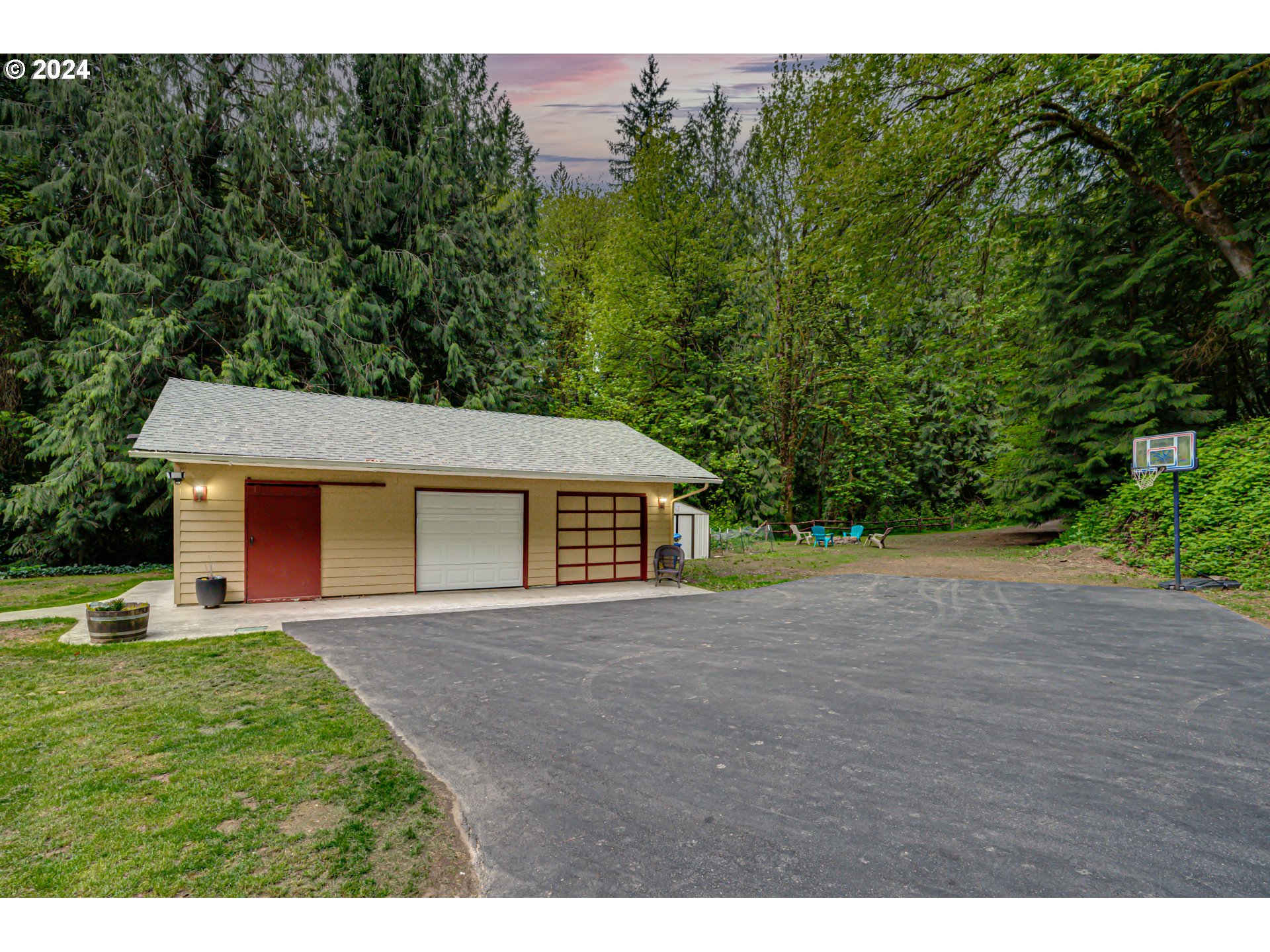631 Clark Creek Road Longview, WA 98632 - Photo 32 of 40 a front view of a house with a yard and garage