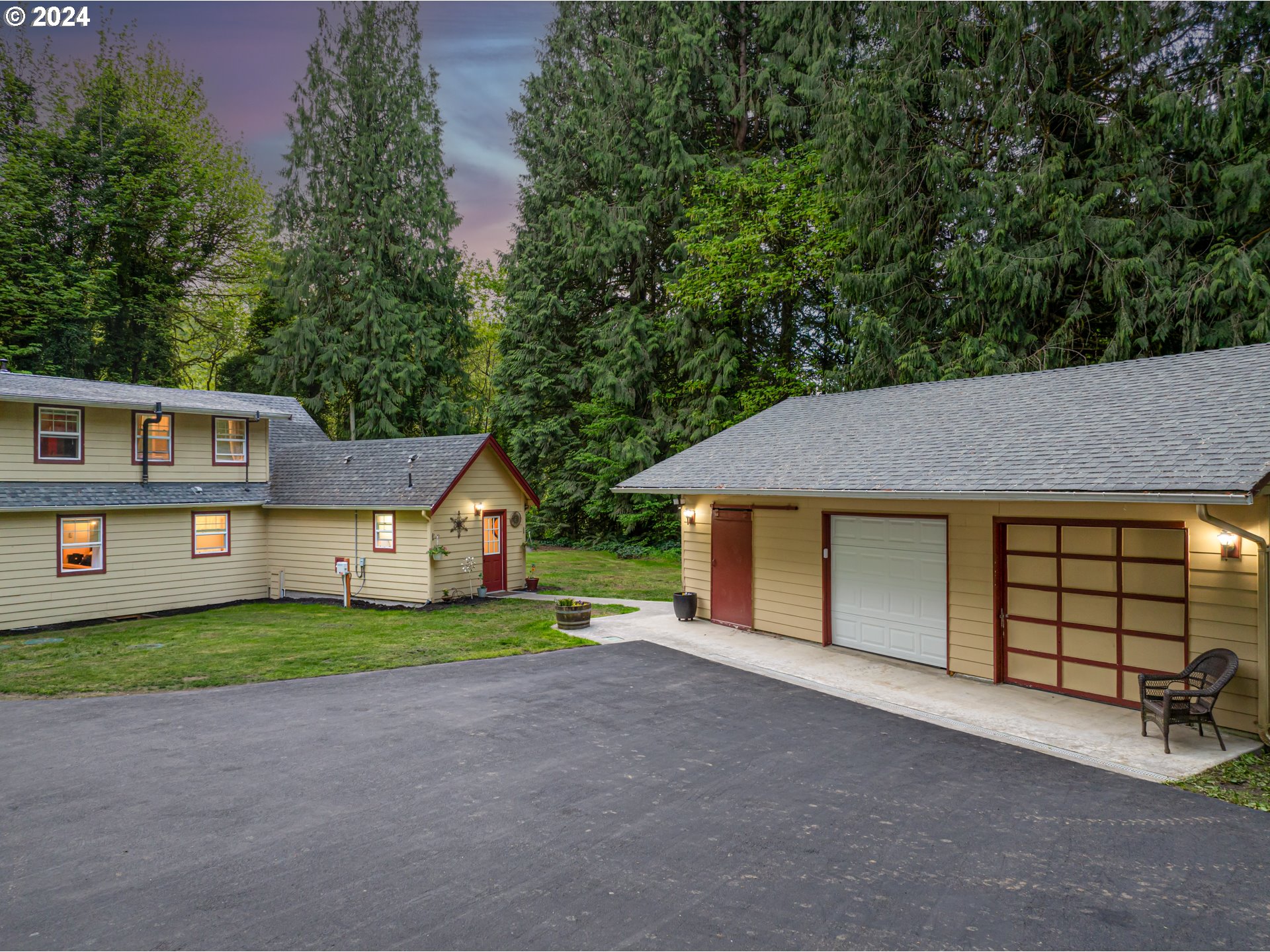 631 Clark Creek Road Longview, WA 98632 - Photo 34 of 40 a front view of a house with a yard and garage