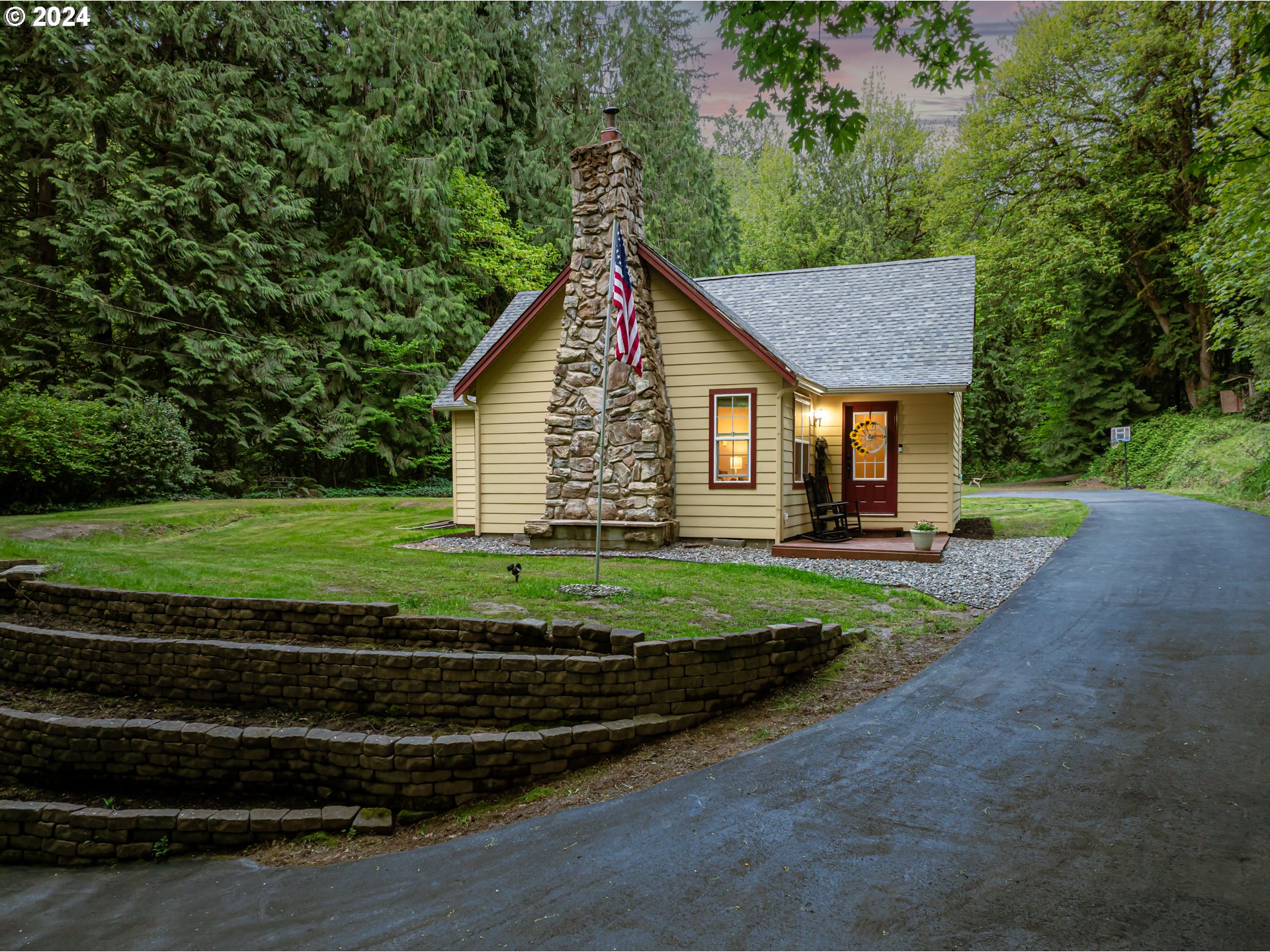 631 Clark Creek Road Longview, WA 98632 - Photo 4 of 40 a front view of a house with a yard
