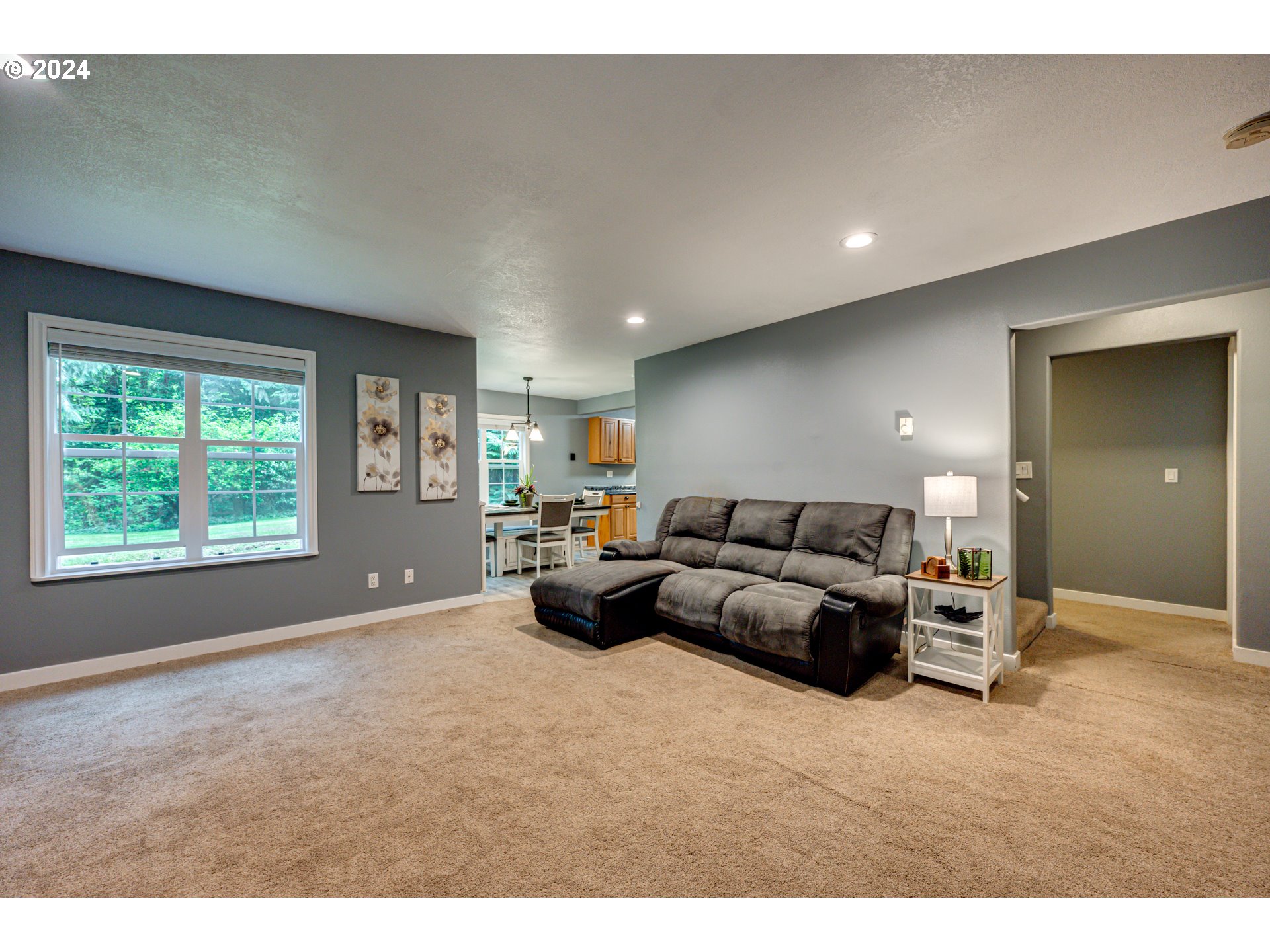 631 Clark Creek Road Longview, WA 98632 - Photo 6 of 40 a living room with furniture and a large window