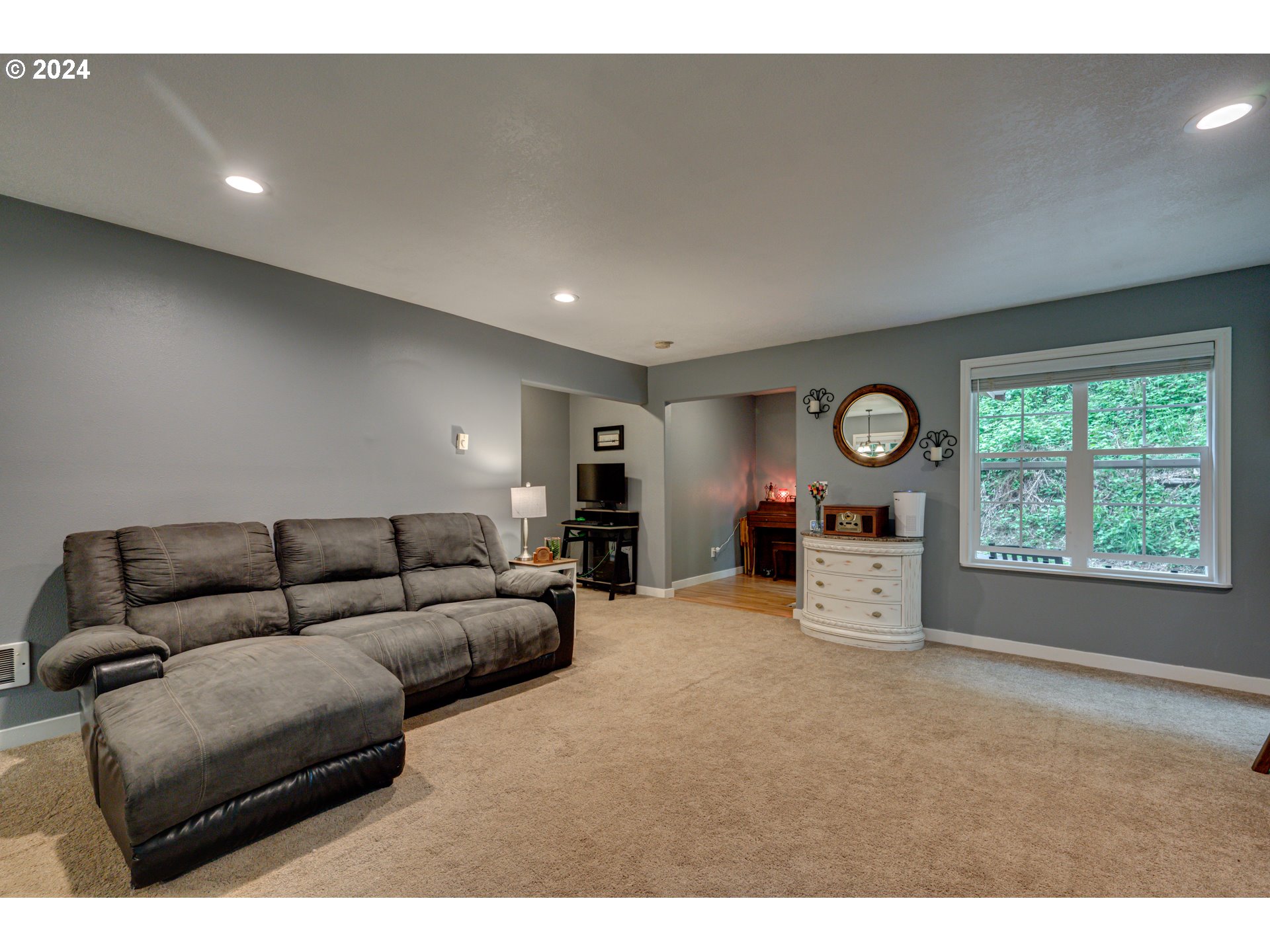 631 Clark Creek Road Longview, WA 98632 - Photo 7 of 40 a living room with furniture and a window