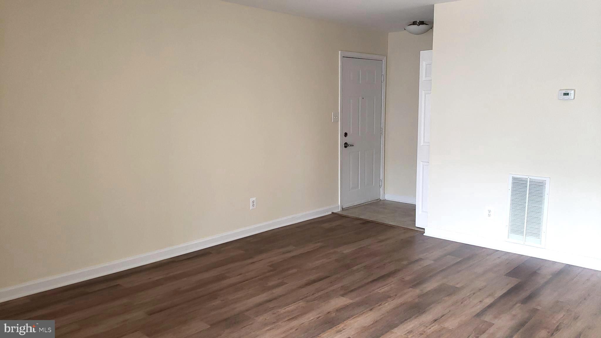 1706 Ascot Way, Unit B Reston, VA 20190 - Photo 3 of 31 Living room and foyer