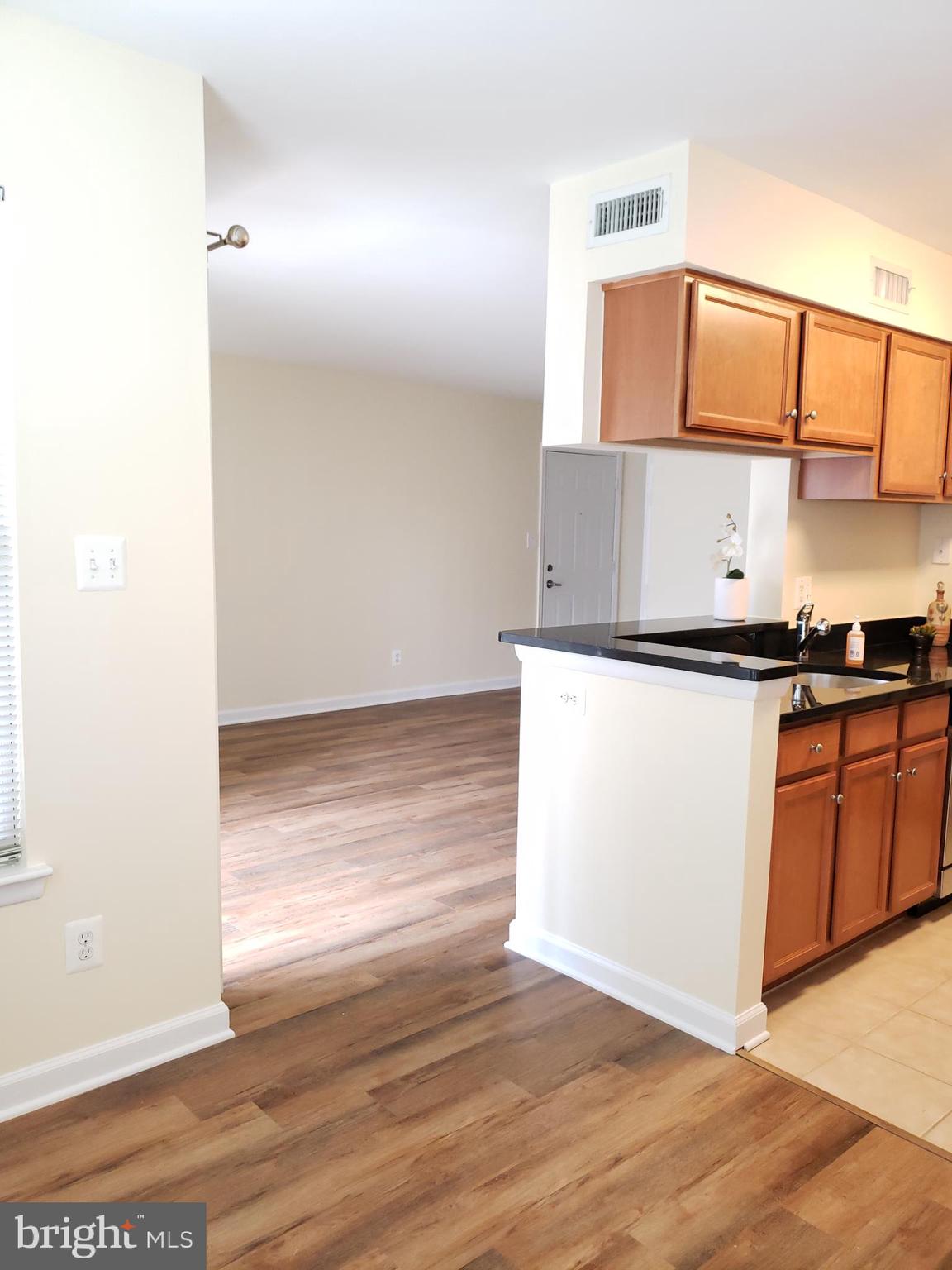1706 Ascot Way, Unit B Reston, VA 20190 - Photo 7 of 31 Dinning room next to kitchen