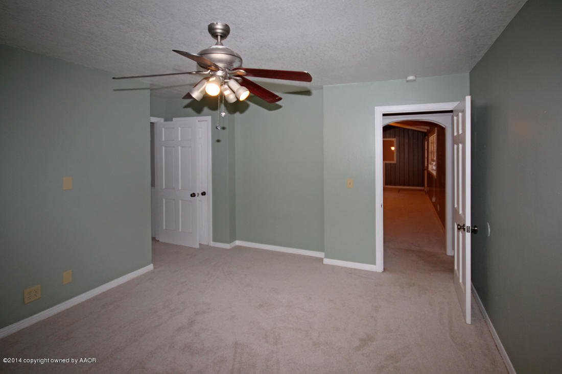 7203 Elmhurst Road Amarillo, TX 79106 - Photo 26 of 30 a view of a chandelier fan in a room