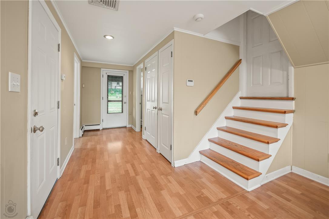 2439 Congress Street Allentown, PA 18104 - Photo 16 of 34 a view of a hallway with wooden floor and staircase
