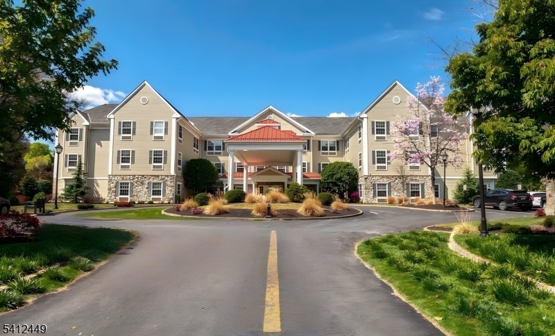 41 Springfield Avenue Summit, NJ 07901 - Photo 1 of 19 a view of a house with outdoor space and sitting area