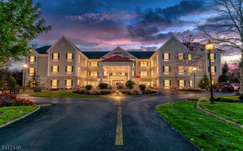 41 Springfield Avenue Summit, NJ 07901 - Photo 18 of 19 a front view of a building with a garden