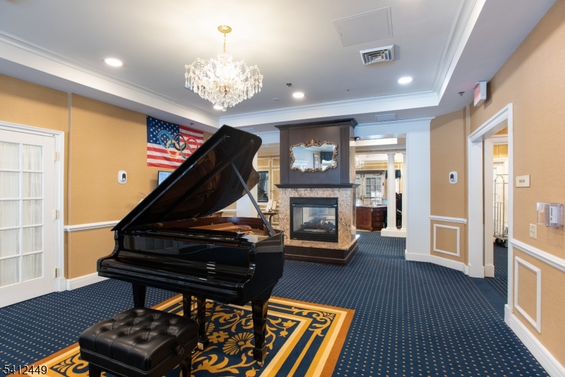 41 Springfield Avenue Summit, NJ 07901 - Photo 6 of 19 a living room with furniture and a fireplace